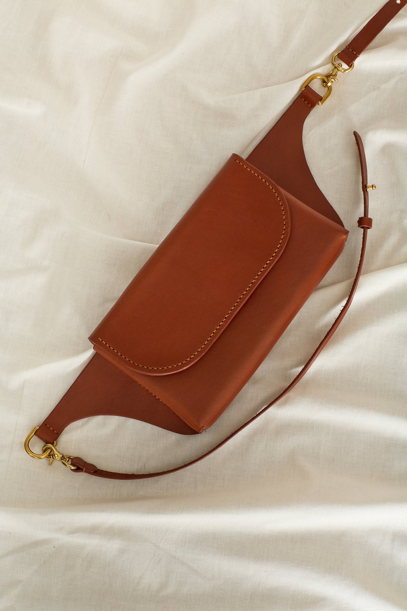 Aerial view of the Effie leather belt bag in maroon